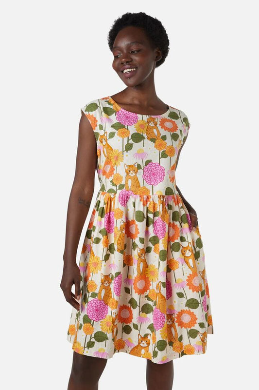 Image of a model wearing Dress. Productname: Cute Cat Sleeveless Dress in Cream colour by brand - Princess Highway