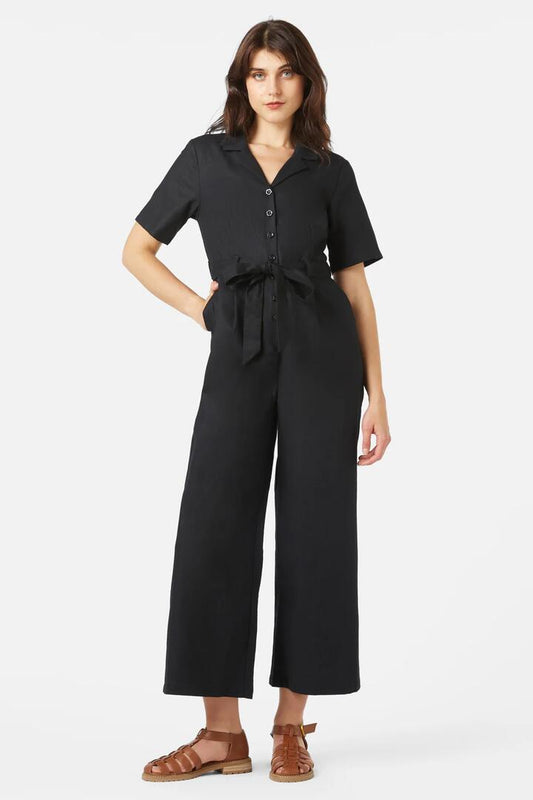 Image of a model wearing Outerwear. Productname: Daisy Jumpsuit in Black colour by brand - Princess Highway