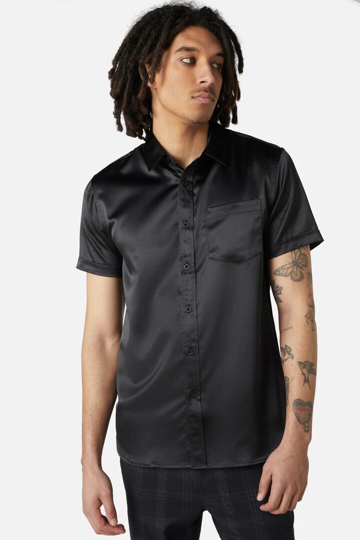 Image of a model wearing Shorts. Productname: Industrial Hybrid Short Sleeve Shirt in Black colour by brand - Dangerfield