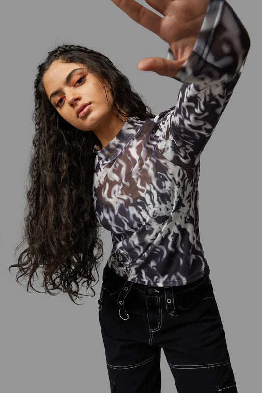 Image of a model wearing Tops. Productname: Up In Flames Top in Black colour by brand - Black Friday