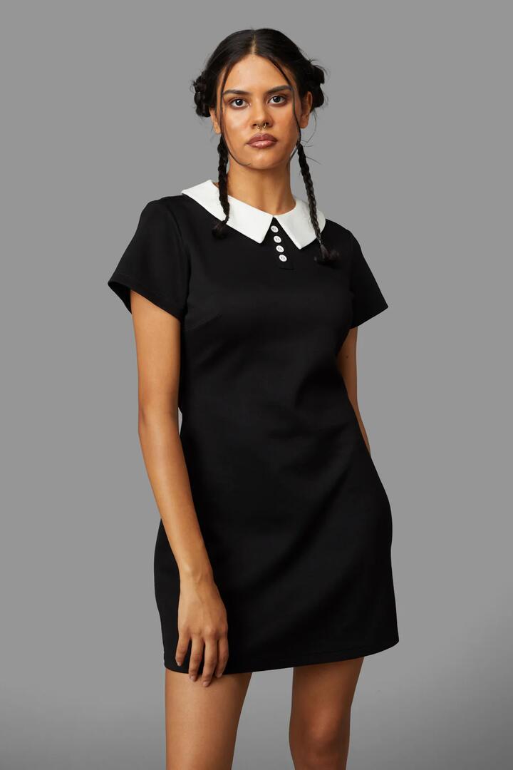 Image of a model wearing Dress. Productname: Jenna Dress in Black colour by brand - Black Friday