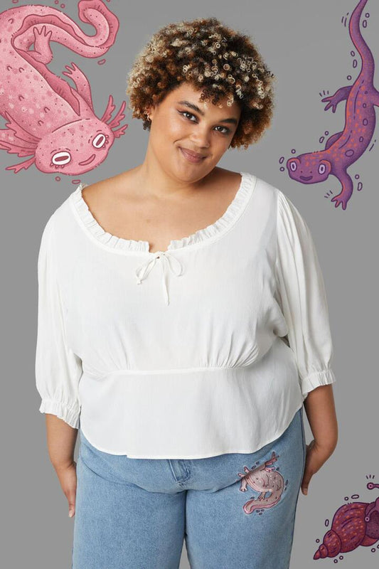 Image of a model wearing Tops. Productname: Curve Lily Pad Blouse in Cream colour by brand - Black Friday