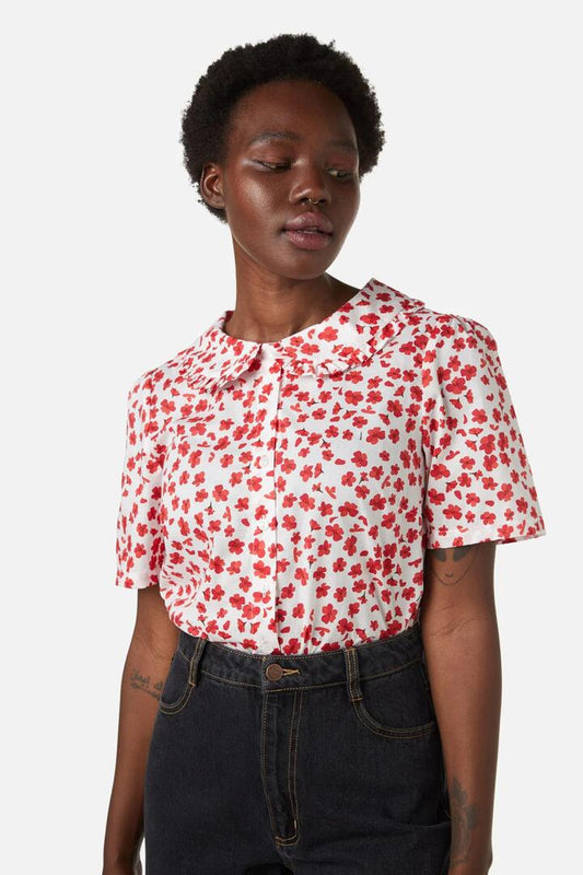 Image of a model wearing Tops. Productname: Mille Fleur Blouse in Cream colour by brand - Princess Highway