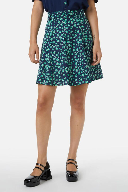 Image of a model wearing Skirts. Productname: Mille Fleur Skirt in Navy colour by brand - Princess Highway