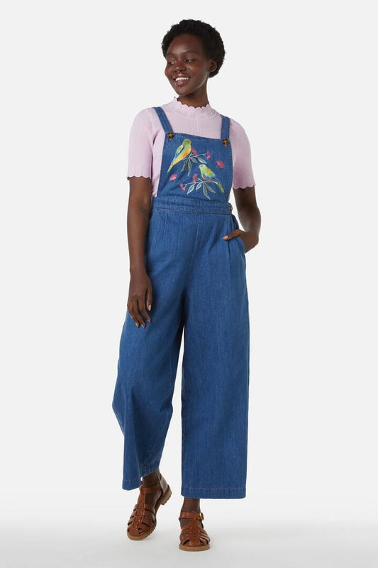 Image of a model wearing Pants. Productname: Parrot Emb Overall in Mid Denim colour by brand - Princess Highway