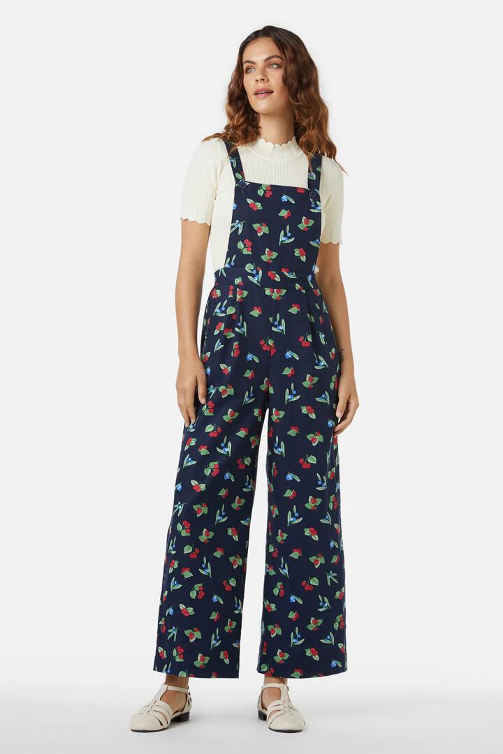 Image of a model wearing Pants. Productname: Berry Overall in Navy colour by brand - Princess Highway