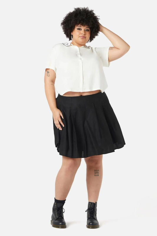 Image of a model wearing Skirts. Productname: Curve Basic Starlight Pleated Skirt in Black colour by brand - Dangerfield