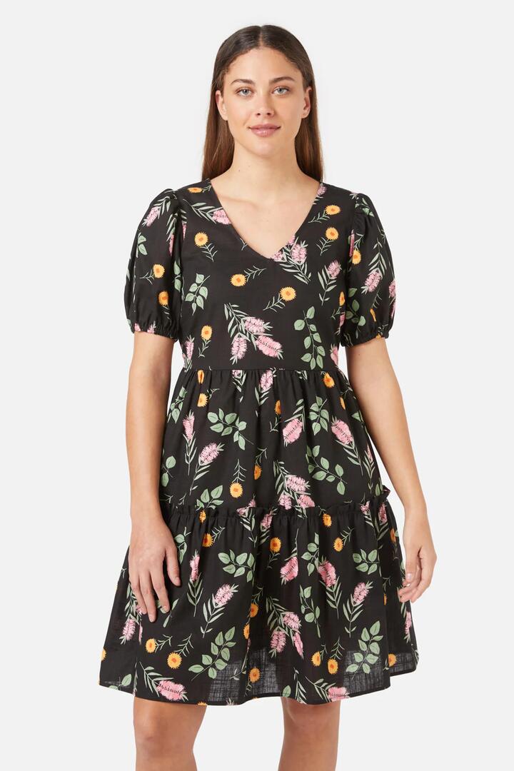 Image of a model wearing Dress. Productname: Wild Flower Mini Dress in Black colour by brand - Princess Highway