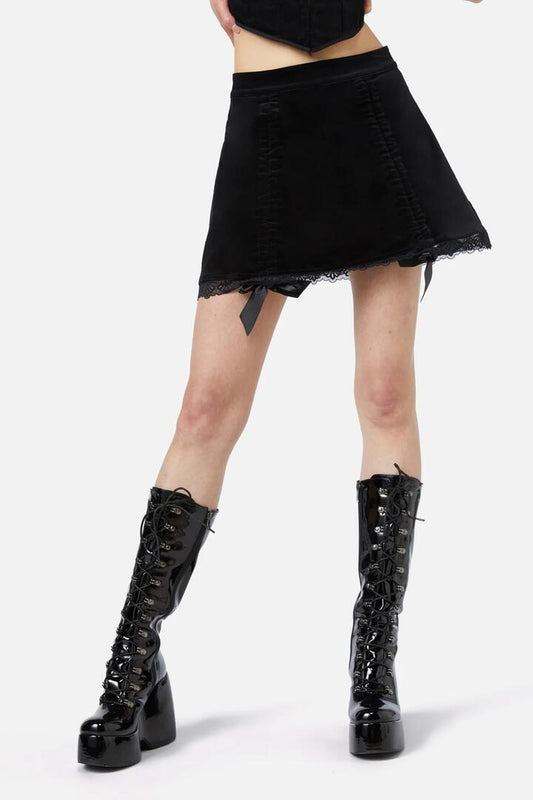 Image of a model wearing Skirts. Productname: Keep Sake Velvet Skort in Black colour by brand - Dangerfield