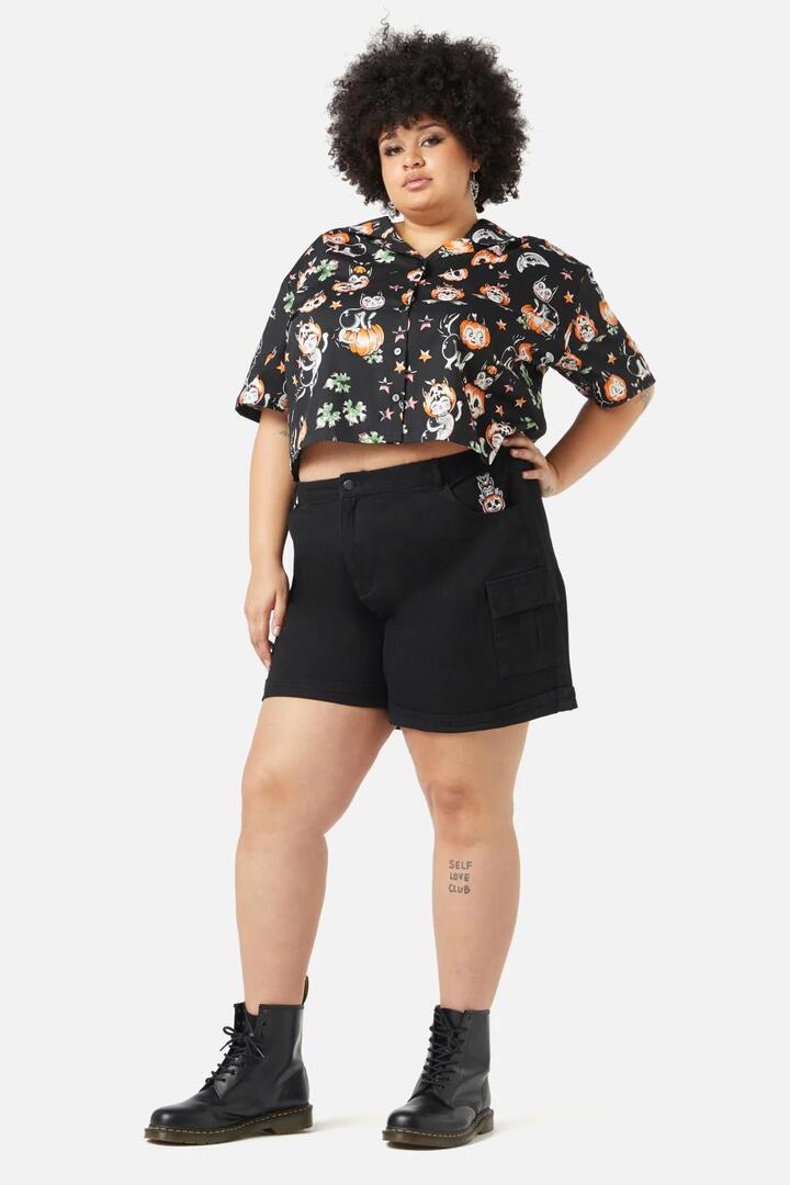 Image of a model wearing Tops. Productname: Curve Pumpkin Patch Kitty Blouse in Black colour by brand - Black Friday