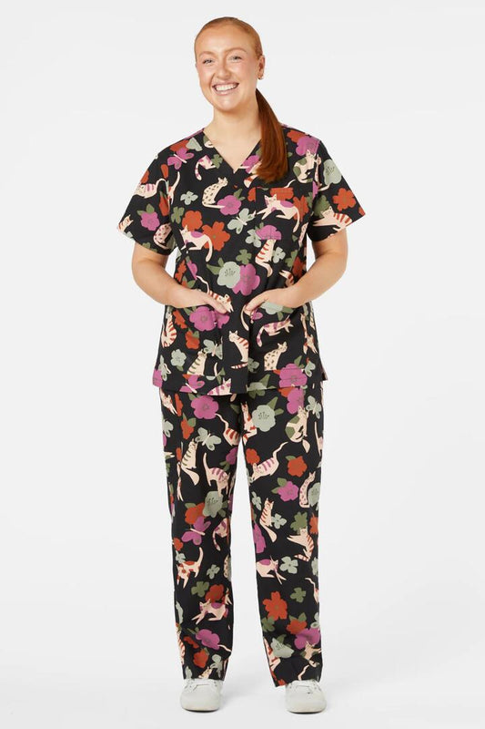 Image of a model wearing Uniforms & Workwear. Productname: Love Cats Scrub Set in Navy colour by brand - Scrubs With Love