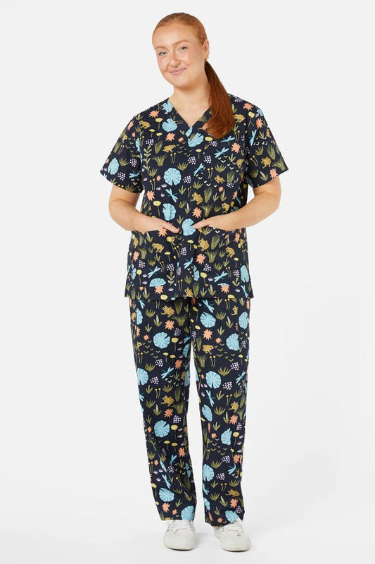 Image of a model wearing Uniforms & Workwear. Productname: Yellow Spotted Tree Frog Scrub Set in Navy colour by brand - Scrubs With Love