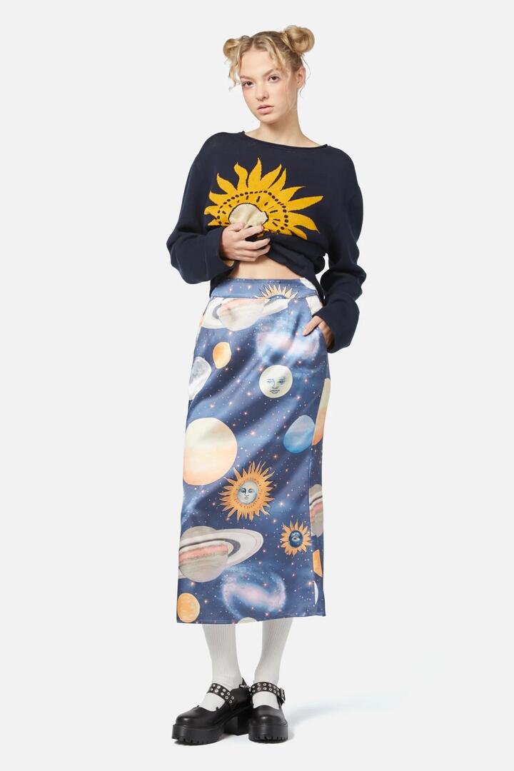 Image of a model wearing Skirts. Productname: Moonlit Satin Skirt in Navy colour by brand - Dangerfield