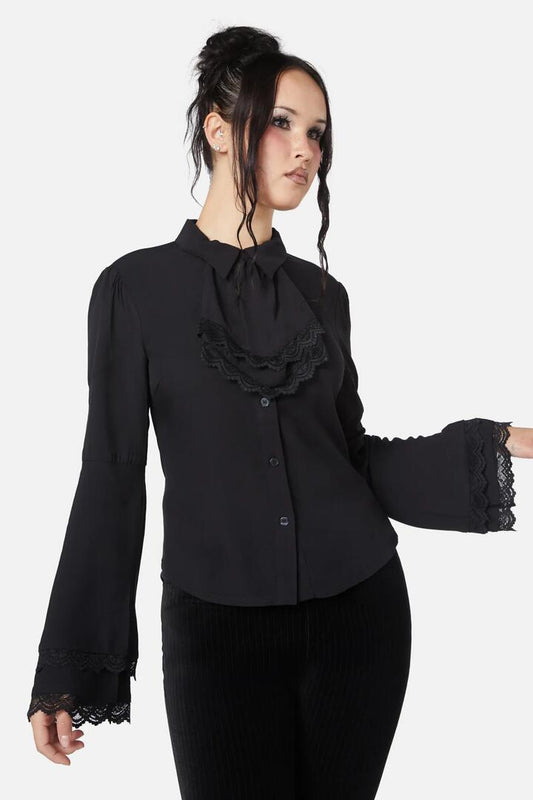 Image of a model wearing Tops. Productname: Still Life Cravat Blouse in Black colour by brand - Dangerfield
