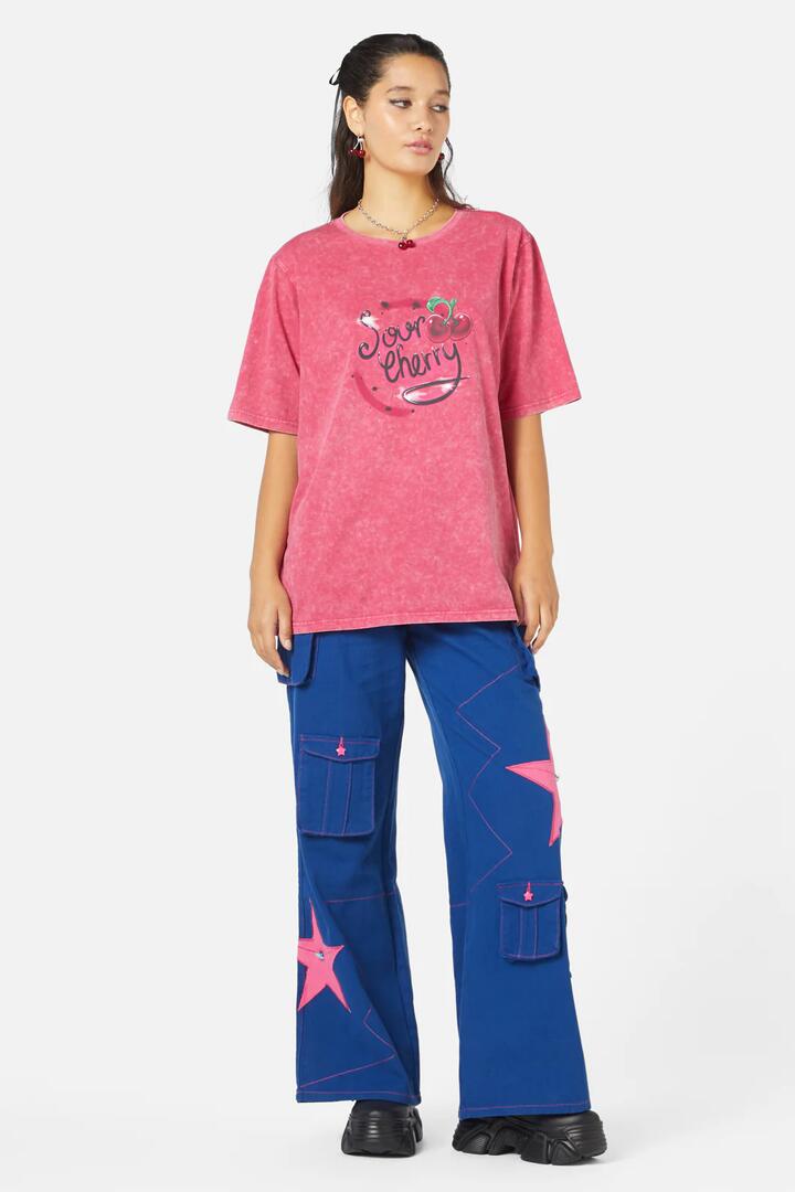 Image of a model wearing Tops. Productname: Airbrush Sour Cherry Tee in Pink colour by brand - Black Friday