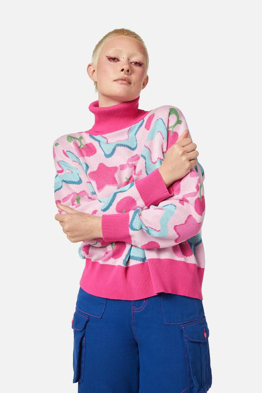 Image of a model wearing Tops. Productname: So Sweet Turtle Neck Knit in Pink colour by brand - Black Friday