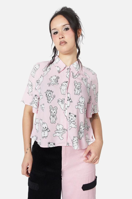 Image of a model wearing Tops. Productname: Cherub Face Printed Blouse in Pink colour by brand - Dangerfield