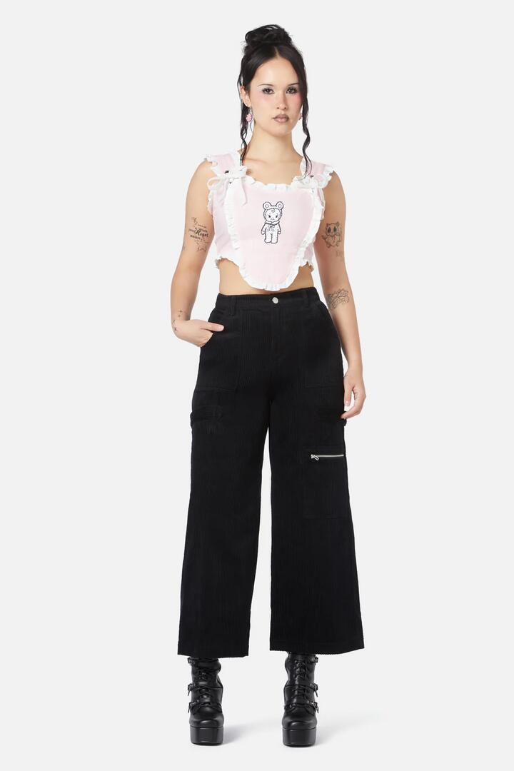 Image of a model wearing Pants. Productname: Dolly Cord Wide Leg Cargo in Black colour by brand - Dangerfield
