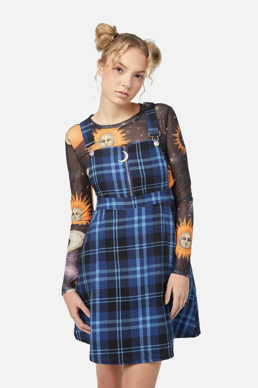 Image of a model wearing Dress. Productname: Moonlit Tartan Pinny in Navy colour by brand - Dangerfield