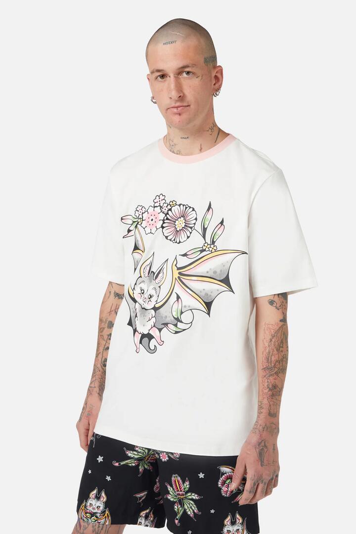 Image of a model wearing Tops. Productname: Fruit Bat Tee in Cream colour by brand - Black Friday