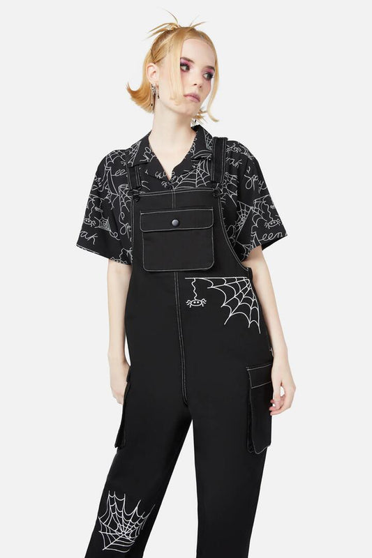 Image of a model wearing Pants. Productname: Elm Embroidery Overalls in Black colour by brand - Black Friday