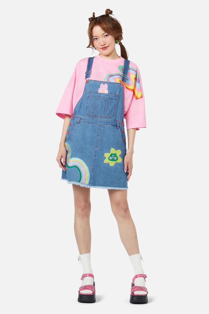 Image of a model wearing Dress. Productname: Electric Patch Pinny in Blue colour by brand - Dangerfield