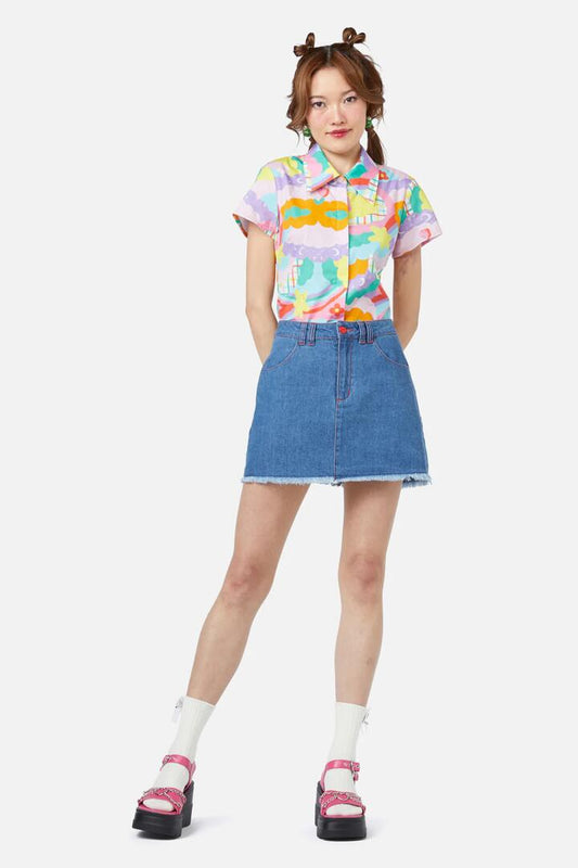 Image of a model wearing Denim. Productname: Electric Patch Denim Mini Skirt in Blue colour by brand - Dangerfield