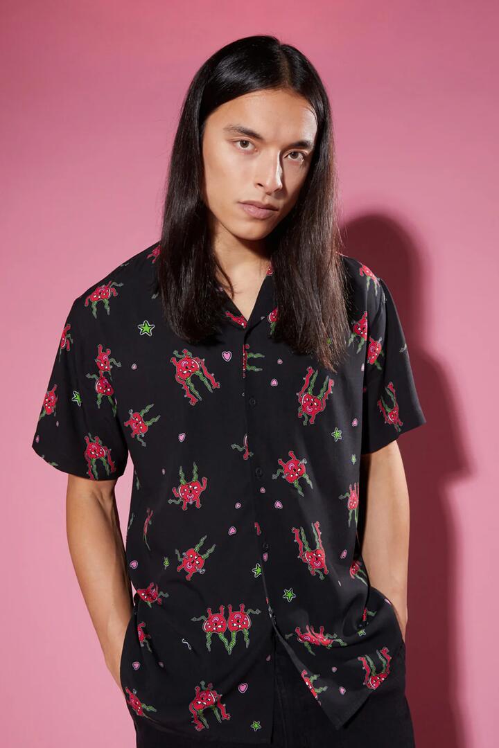 Image of a model wearing Tops. Productname: Cheeky Cherries SS Shirt in Black colour by brand - Black Friday