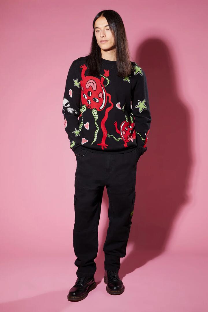 Image of a model wearing Tops. Productname: Cheeky Cherries Knit in Black colour by brand - Black Friday