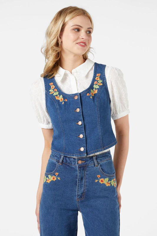 Image of a model wearing Tops. Productname: Nasturtium Emb Vest in Mid Denim colour by brand - Princess Highway