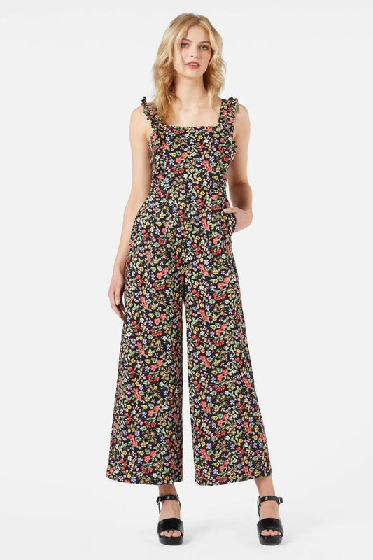 Image of a model wearing Outerwear. Productname: Ella Flora Jumpsuit in Black colour by brand - Princess Highway