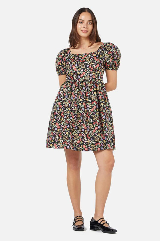 Image of a model wearing Dress. Productname: Ella Flora Mini Dress in Black colour by brand - Princess Highway