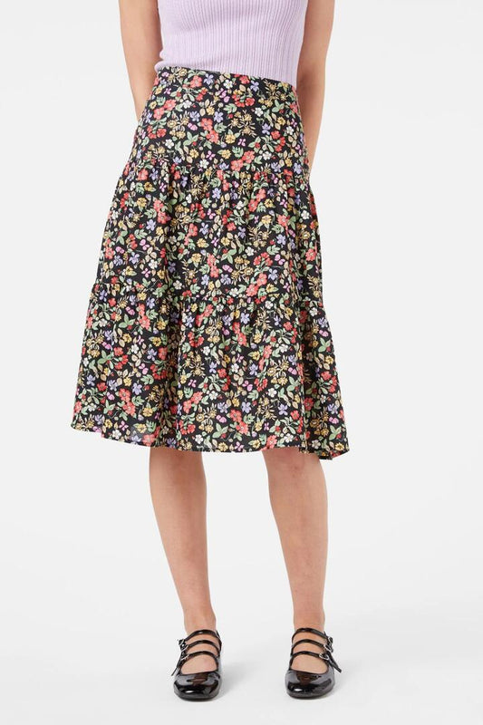 Image of a model wearing Skirts. Productname: Ella Flora Skirt in Black colour by brand - Princess Highway