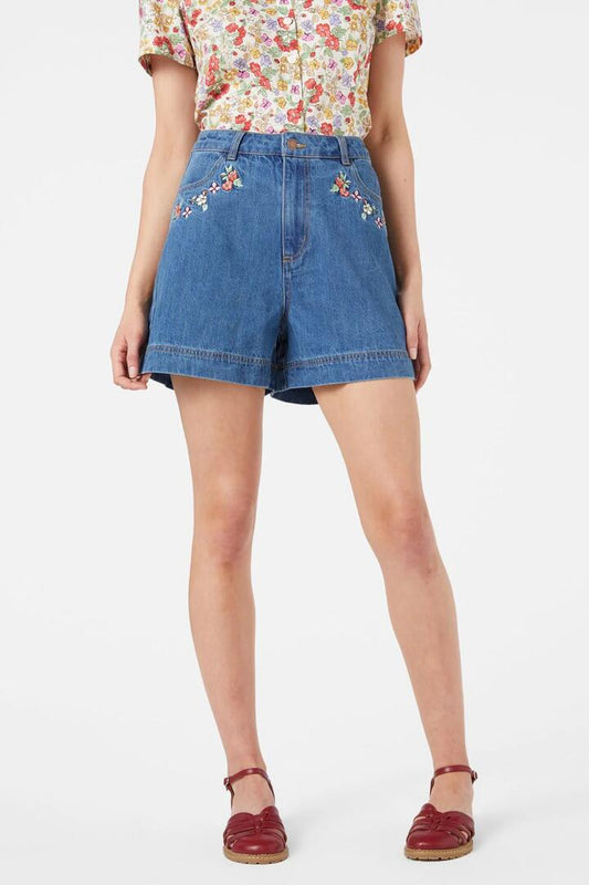 Image of a model wearing Shorts. Productname: Papillon Emb Short in Mid Denim colour by brand - Princess Highway