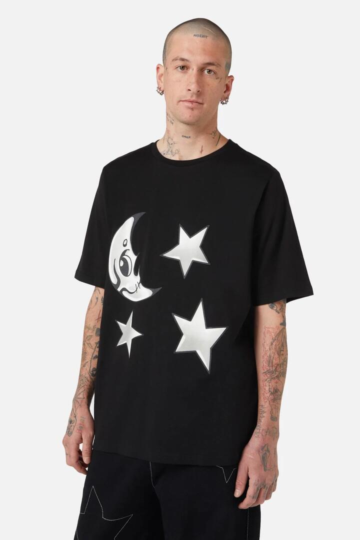 Image of a model wearing Tops. Productname: Solar Flare Tee in Black colour by brand - Black Friday