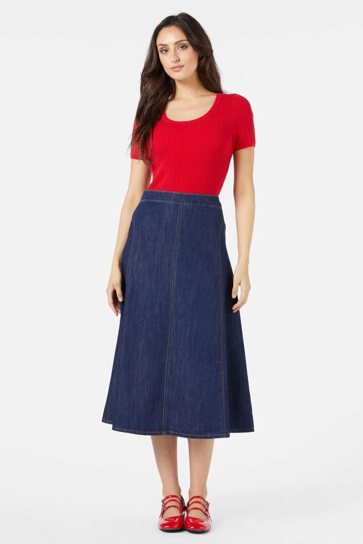 Image of a model wearing Skirts. Productname: Becca Midi Skirt in Dark Denim colour by brand - Princess Highway