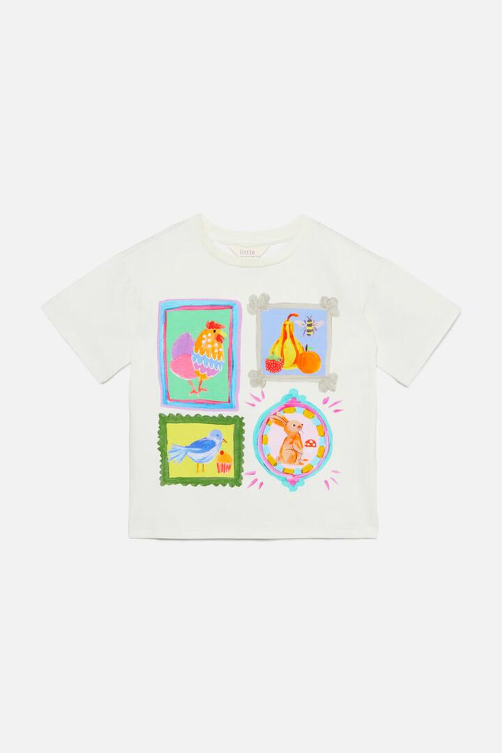 Image of a model wearing Tops. Productname: Cottage Kids SS Tee in Cream colour by brand - Princess Highway Kids