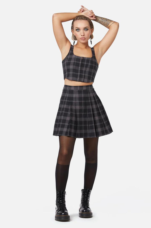 Image of a model wearing Skirts. Productname: Victoria Tartan Pleated Skirt in Black colour by brand - Dangerfield