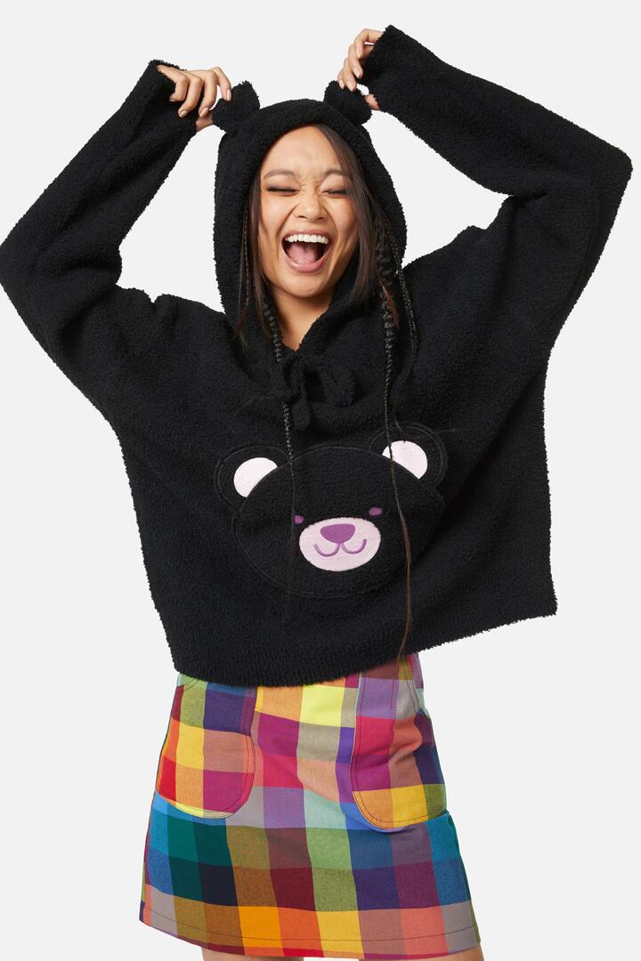 Image of a model wearing Tops. Productname: Beary Cute Knit in Black colour by brand - Dangerfield