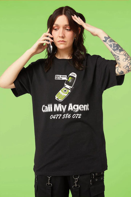 Image of a model wearing Tops. Productname: Call My Agent in Black colour by brand - Pulp Kitchen