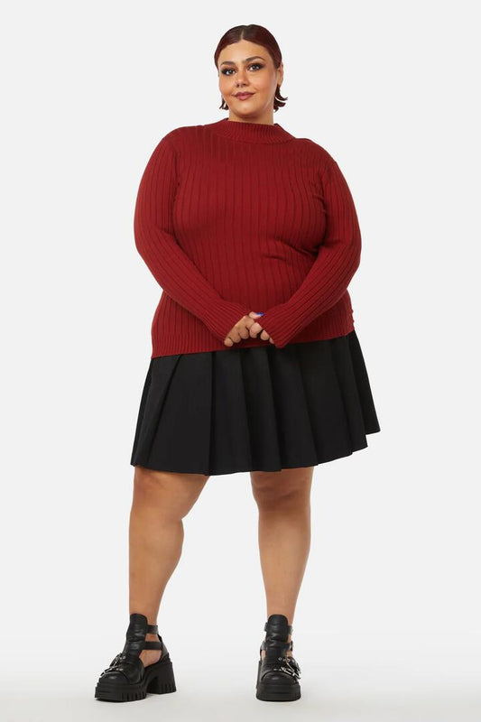 Image of a model wearing Tops. Productname: Curve Grave Respect Knit Skivvy in Red colour by brand - Dangerfield