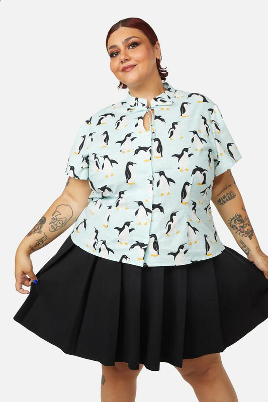 Image of a model wearing Tops. Productname: Curve Penguin Blouse in Blue colour by brand - Dangerfield