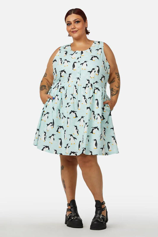 Image of a model wearing Dress. Productname: Curve Penguin Dress in Blue colour by brand - Dangerfield