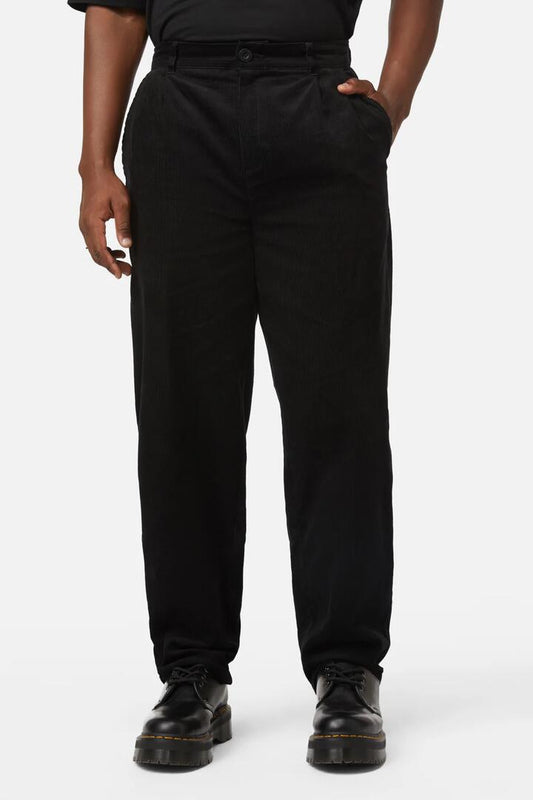 Image of a model wearing Pants. Productname: Shadows Cord Pant in Black colour by brand - Black Friday