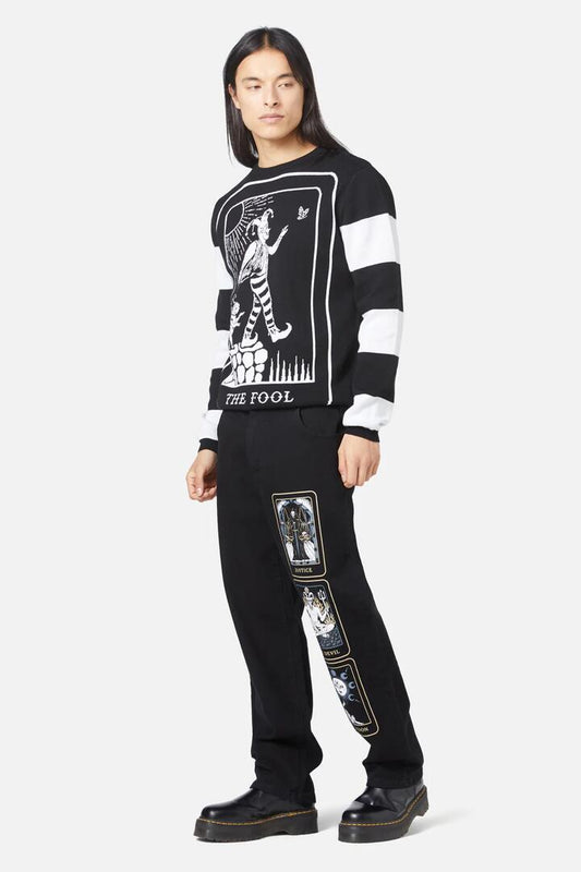 Image of a model wearing Outerwear. Productname: The Fool Stripe Knit Jumper in Black colour by brand - Dangerfield