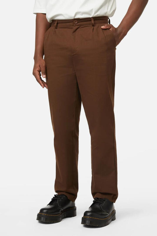Image of a model wearing Pants. Productname: Camp Danger Pant in Brown colour by brand - Dangerfield