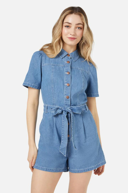 Image of a model wearing Dress. Productname: Chrissy Playsuit in Light Denim colour by brand - Princess Highway