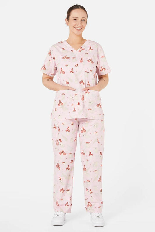 Image of a model wearing Uniforms & Workwear. Productname: Harmony Scrub Set in Pink colour by brand - Dangerfield
