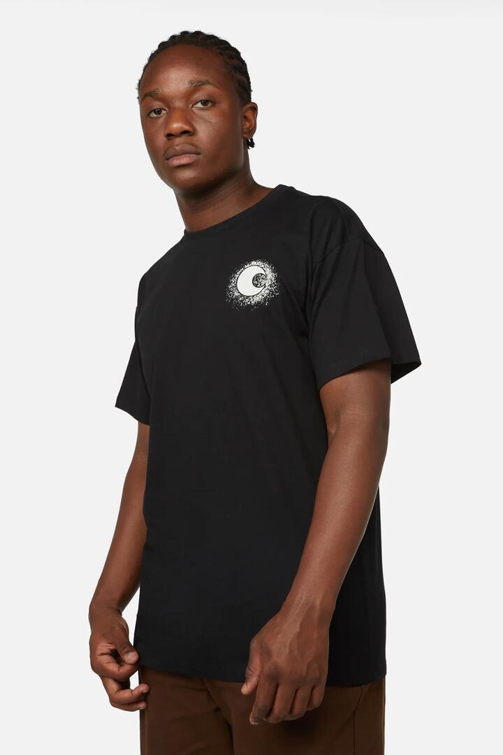 Image of a model wearing Tops. Productname: High Preistess Unisex Tee in Black colour by brand - Dangerfield