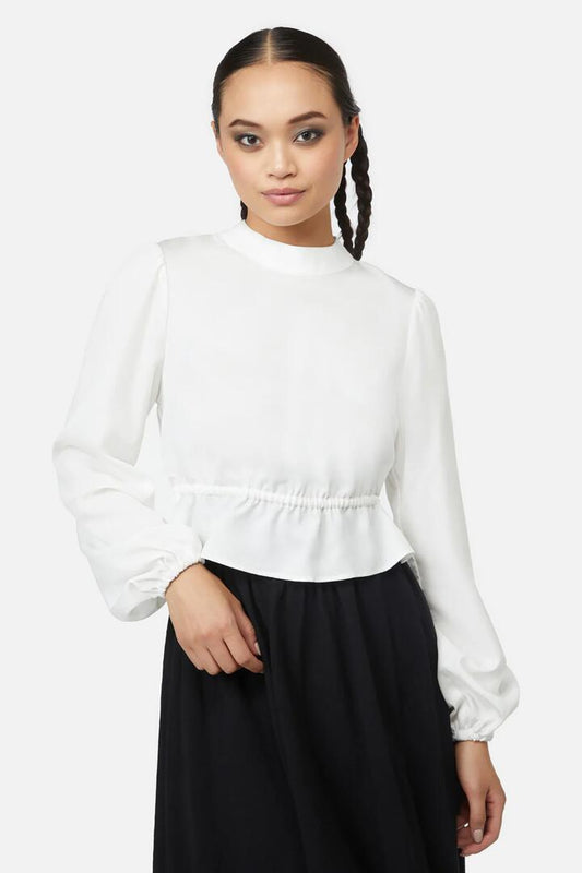 Image of a model wearing Tops. Productname: Busy Blouse in Cream colour by brand - Black Friday